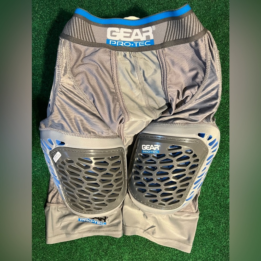 Like new football girdle with hip pads, tail bone pad and thigh pads. Youth 2XL